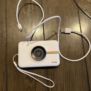 Polaroid snap camera with film
